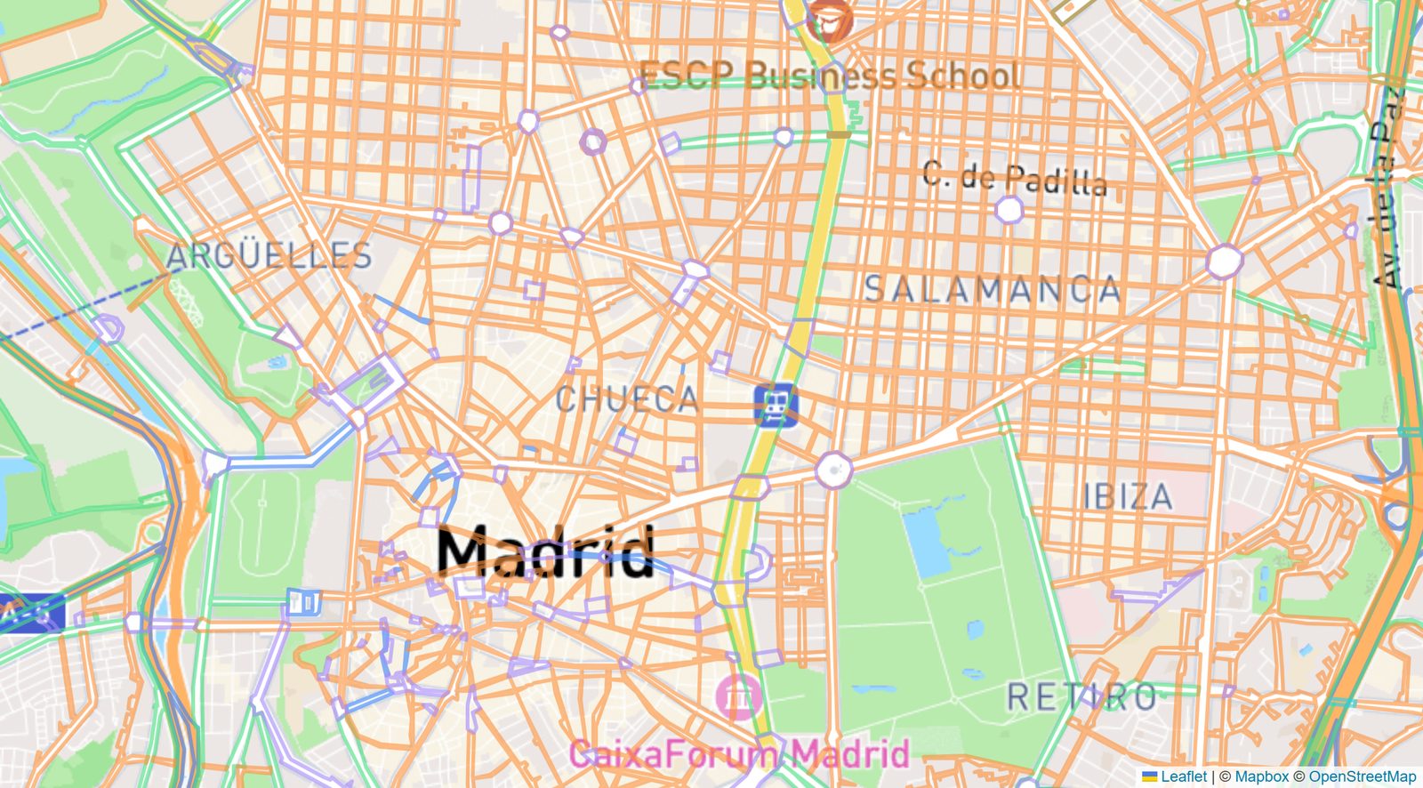 El callejero de Madrid sobre el mapa, con el escudo de la ciudad